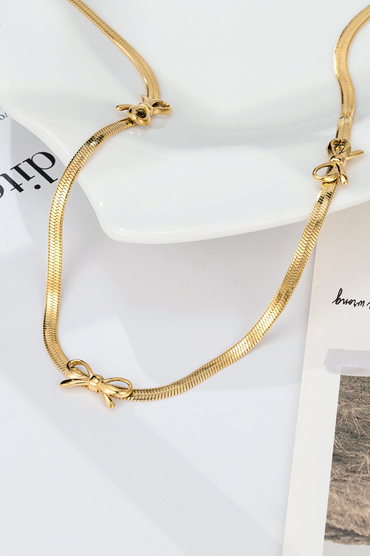 Popular Bowknot Flat Snake Chain Necklace