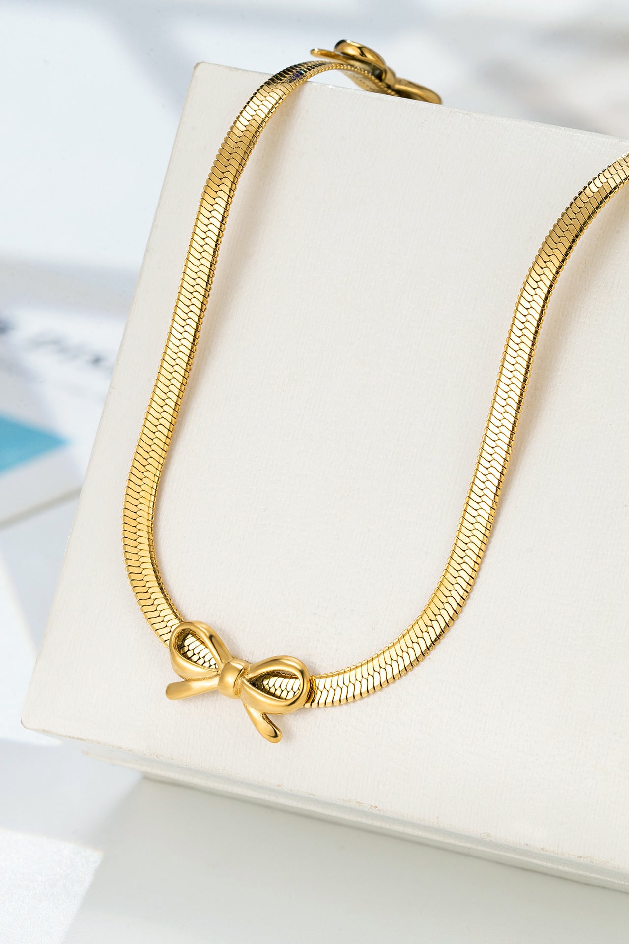 Popular Bowknot Flat Snake Chain Necklace