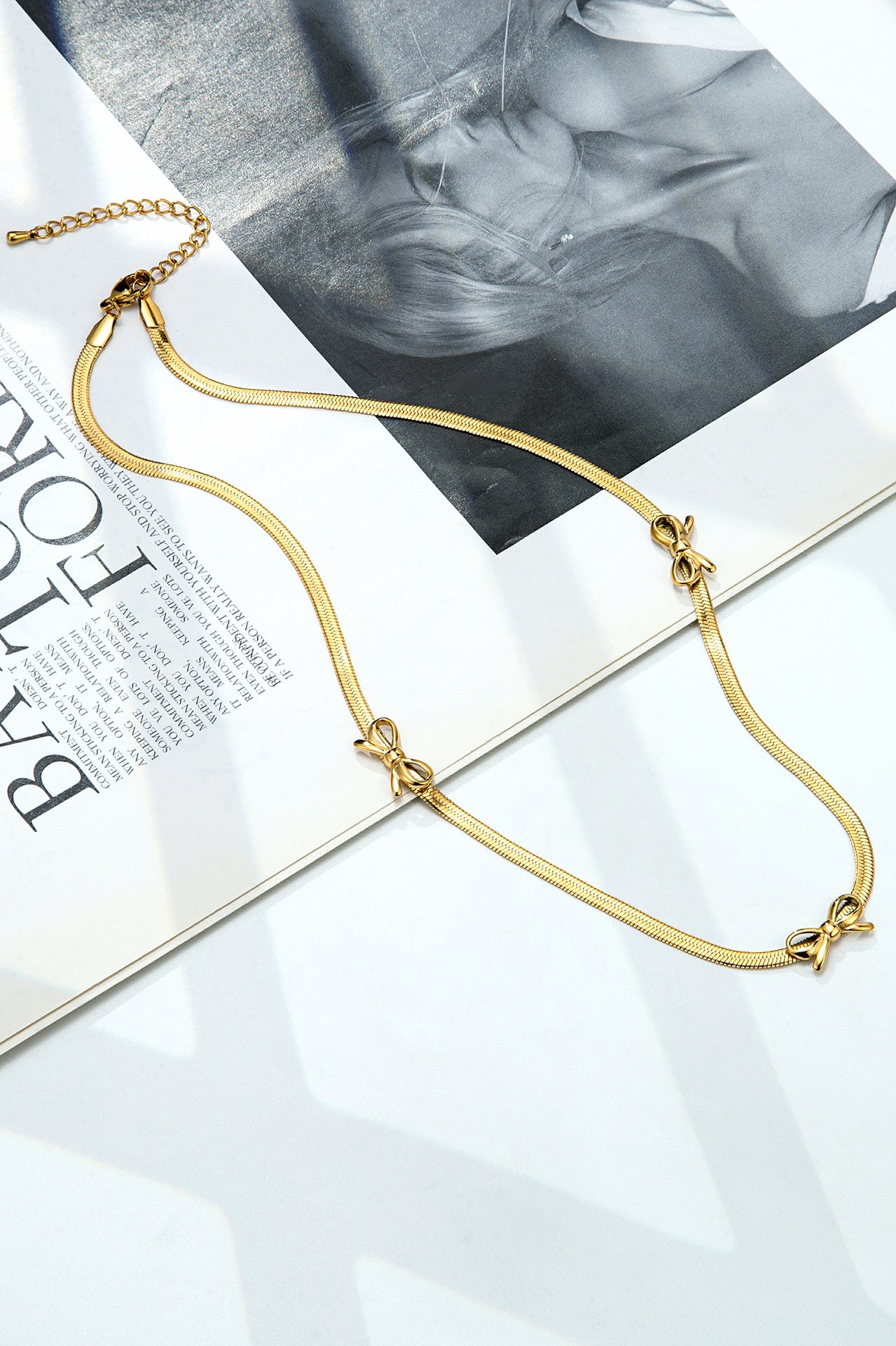 Popular Bowknot Flat Snake Chain Necklace